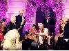 Arpita and Ayush exchanging rings as bhai Salman Khan along with parents Salim Khan, mothers Salma and Helen on stage.