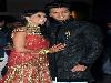 Indian Bollywood couple Ritesh Deshmukh and Genelia D'Souza(L)attend a wedding ceremony in Mumbai on February 4,2012.