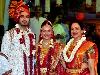 Indian Bollywood actress Esha Deol(C),her mother and actress Hema Malini (R), and groom Bharat Takhtani(L)pose during their wedding in Mumbai on June 29,2012.