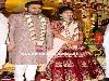 Cinematography Minister Talasani Srinivas Yadav�s daughter Swathi got married to Dr. Ravi Kumar on Sunday.The bride Swathi looked beautiful in a gold kanjeevaram silk saree paired with contrast pink embellished blouse and diamond jewellery. She later changed to a maroon velvet embroidered lehenga and accessorized it with diamond choker set.