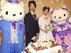 Never moved past your Hello Kitty pencil case? You can pay to have two giant creatures escort you down the aisle,like this couple.