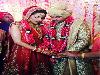 Suresh Raina and Priyanka ChaudharyThe ace batsman of the Indian cricket team, Suresh Raina, tied the knot with his childhood friend, Priyanka Chaudhary, on April 3, 2015, in New Delhi.  It was an arranged marriage, as it was fixed by his mother while he was in Australia for the cricket world cup 2015. While their engagement was a private affair, their wedding was a totally starry event with high-profile guests from the world of cricket, politics, and glam world in attendance.Also Read: The Wedding Story Of Indian Cricketer Suresh Raina And Priyanka Chaudhary